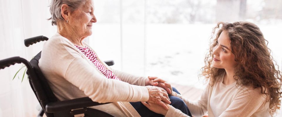 woman with elder woman in wheelchair